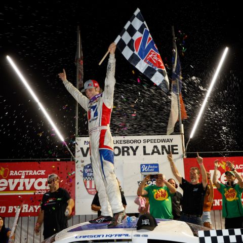 Carson Kvapil celebrates after winning the CARS Tour Window World 125 at North Wilkesboro Speedway.