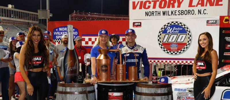 Landen Lewis turned his pole position into a dominant win Friday night, celebrating in Victory Lane with Window World CEO Tammy Whitworth after the Window World 100. (CMS/HHP photography)