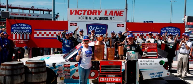 Chandler Smith celebrates in Victory Lane with Window World CEO Tammy Whitworth after his thrilling win in the Window World 250 at North Wilkesboro Speedway. 